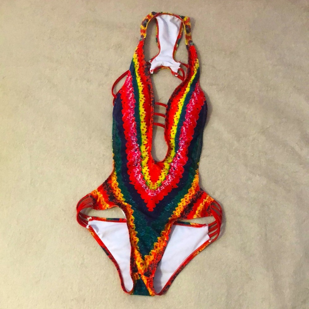 Size medium, rainbow colored one piece